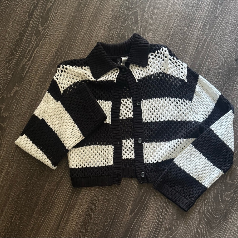 “Divided” Black and White Striped Cardigan Sweater